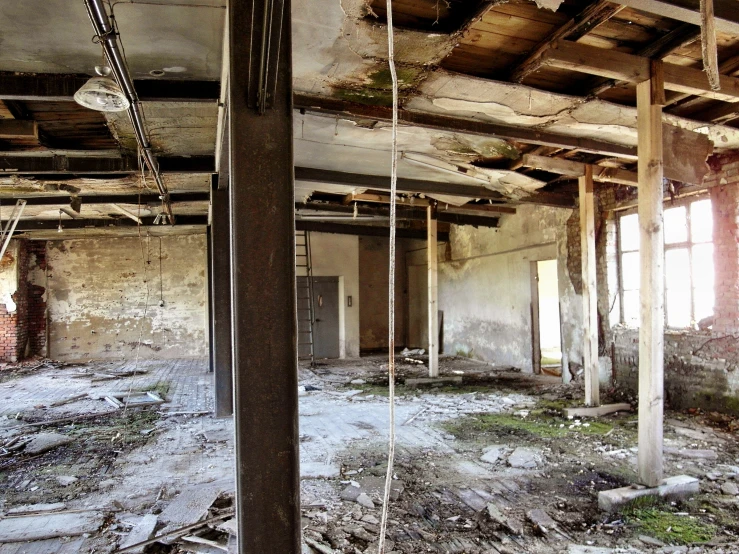 an old abandoned building with the wood exposed