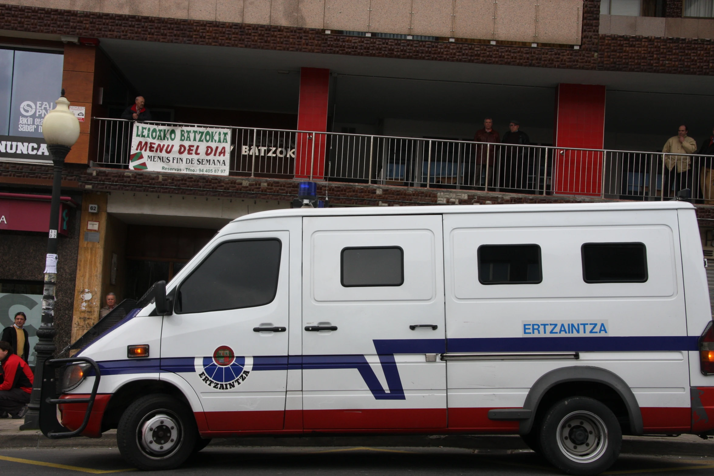 an ambulance parked in front of the building