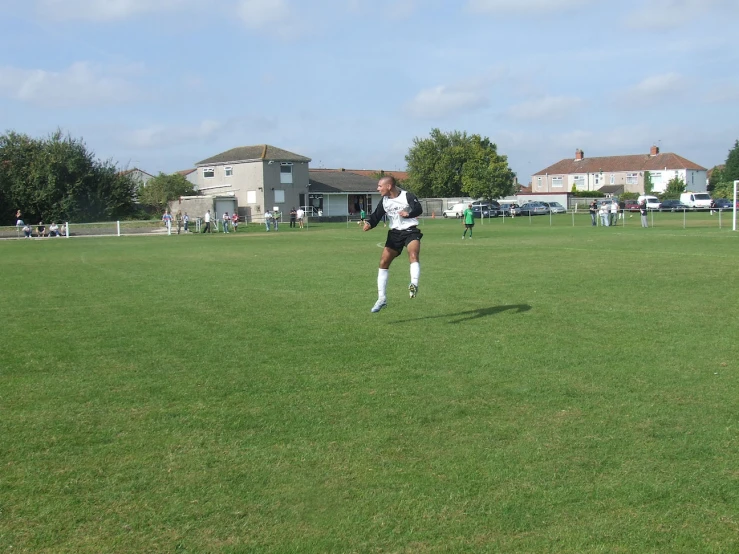 a young man in the middle of playing soccer