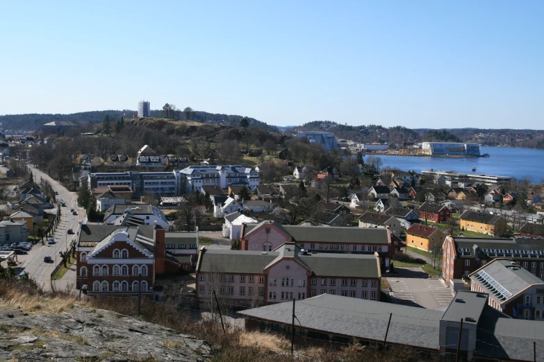 a town has buildings on the right and blue sky on the left