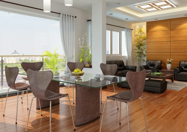 an open living area with leather chairs, glass table and wooden flooring