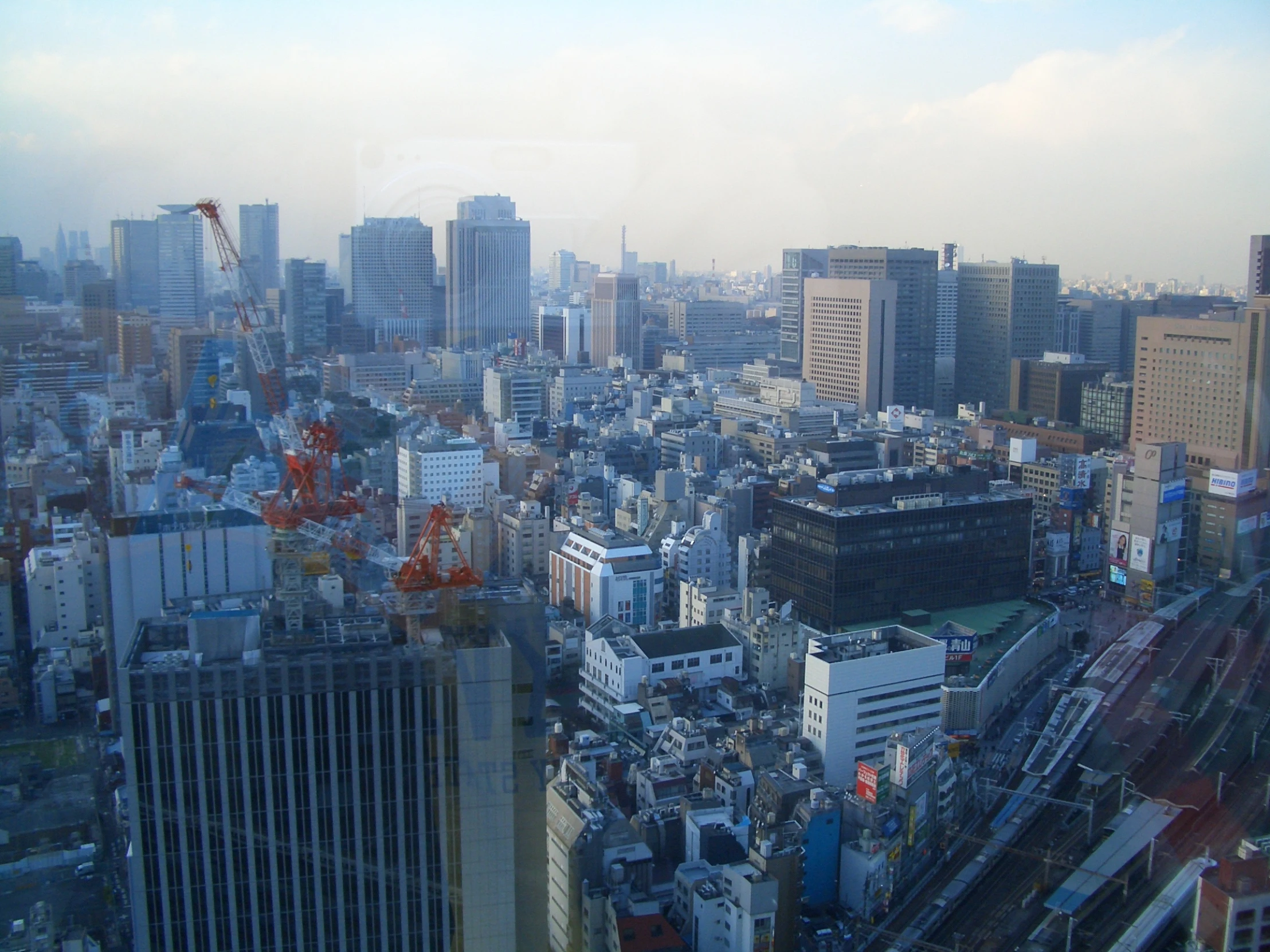 the cityscape shows many tall buildings in it