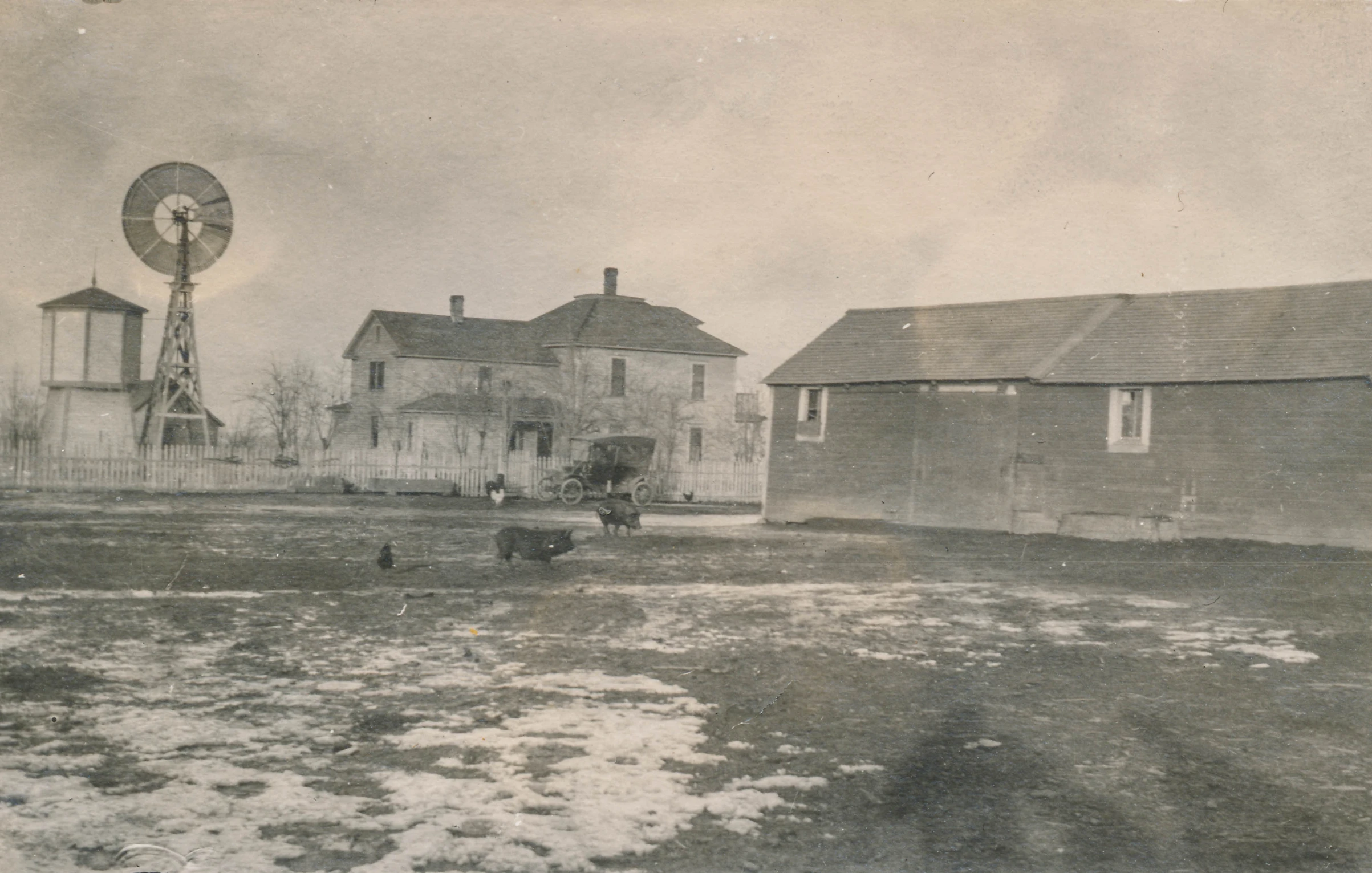 there is an old black and white po of two houses