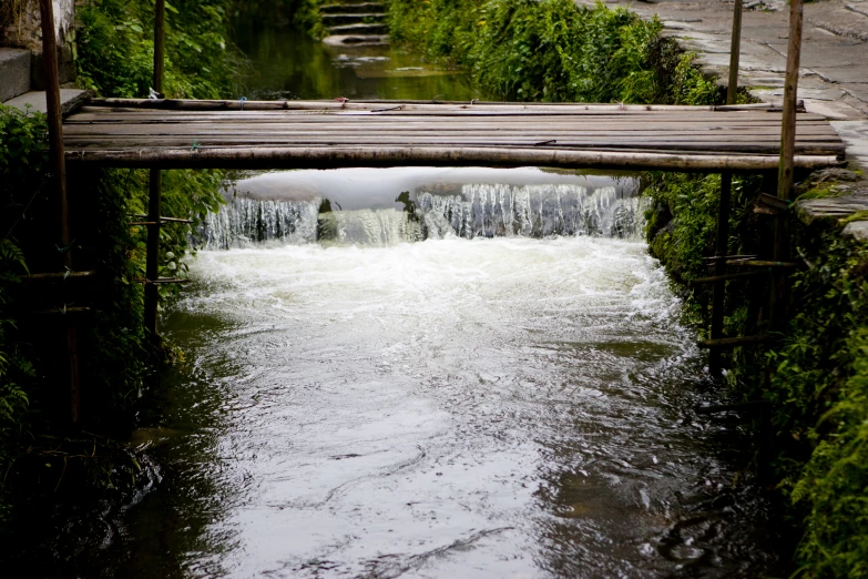 an image of water under an overpass