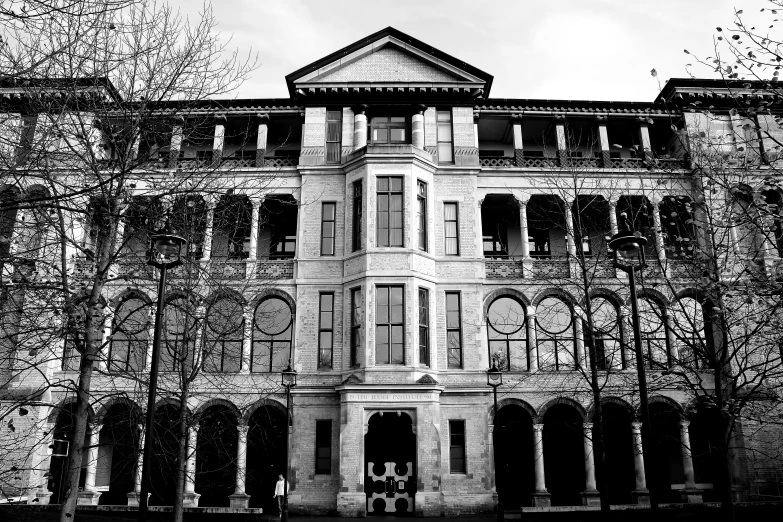 a black and white po of a building with multiple levels