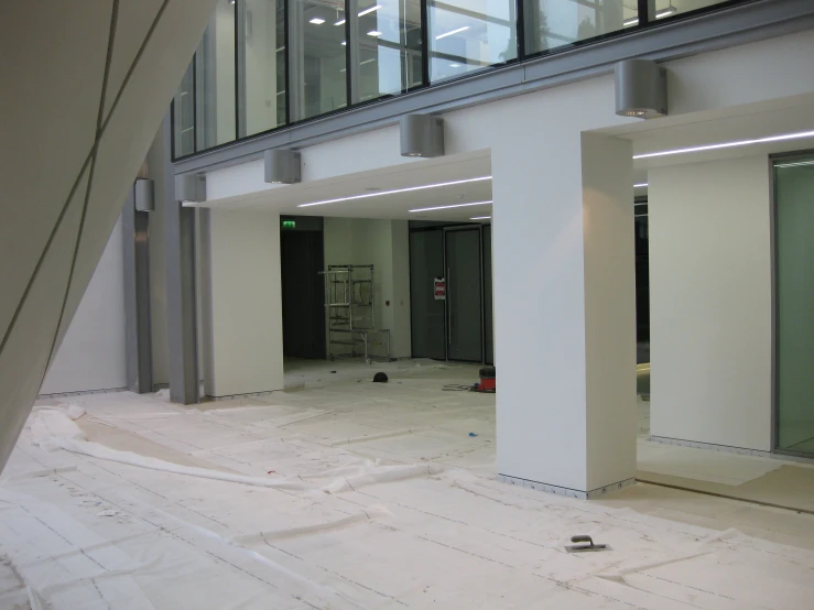 inside of a white building with several pillars