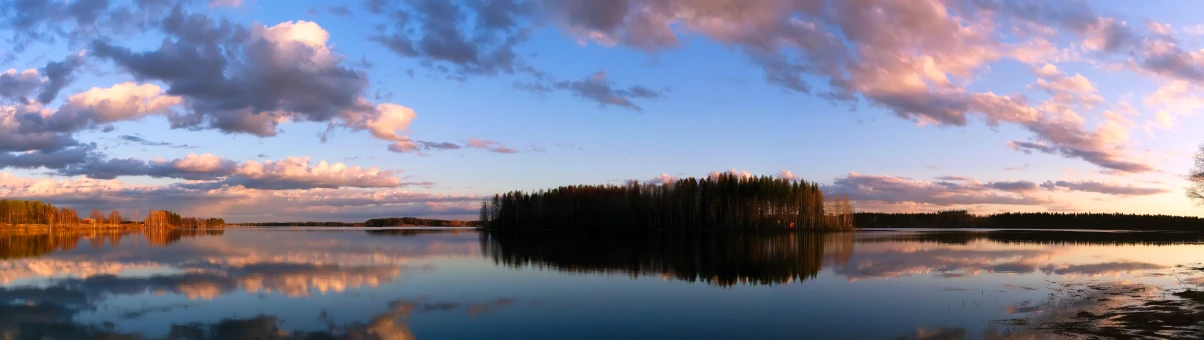 a lake that has a small island in the middle