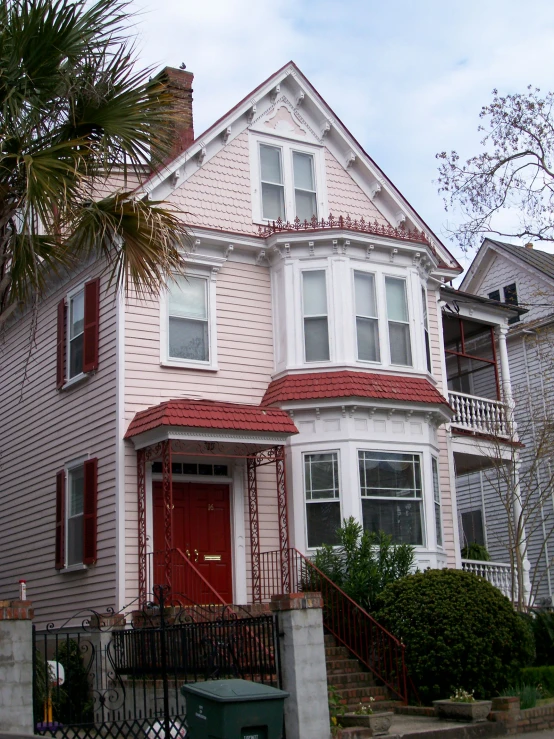 an image of a pretty pink house