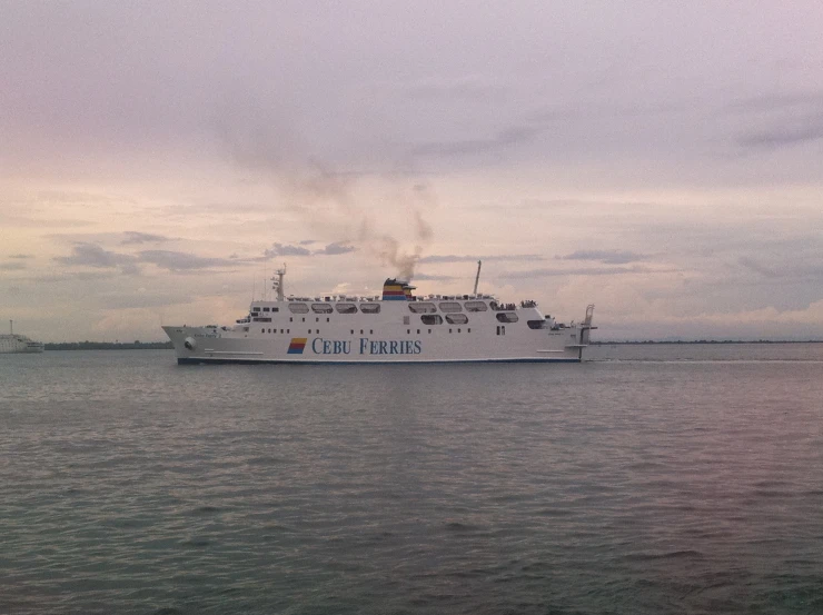 a large passenger ship traveling across the water