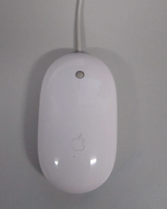 a computer mouse with an apple logo on it