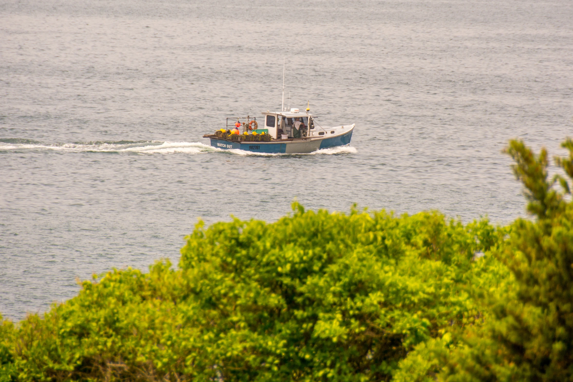 there is a small boat that runs along the water