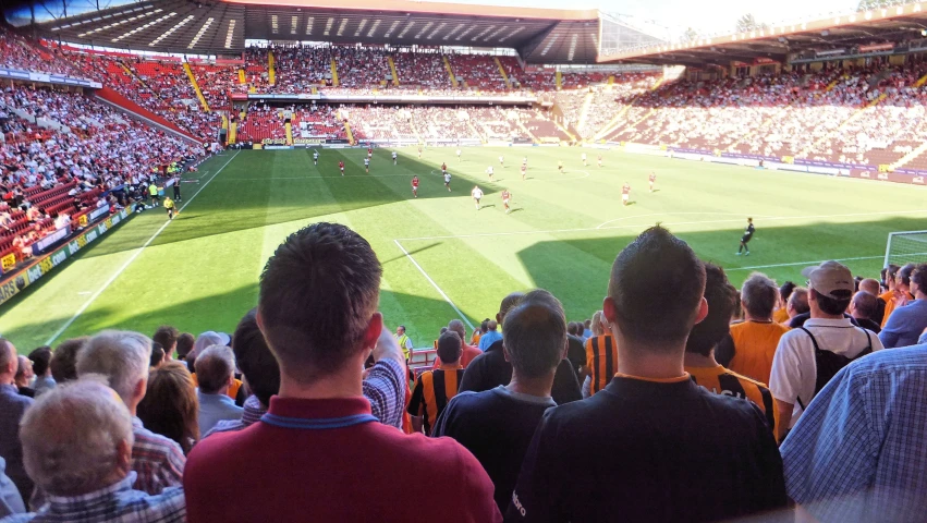 a stadium with an empty soccer field during a game