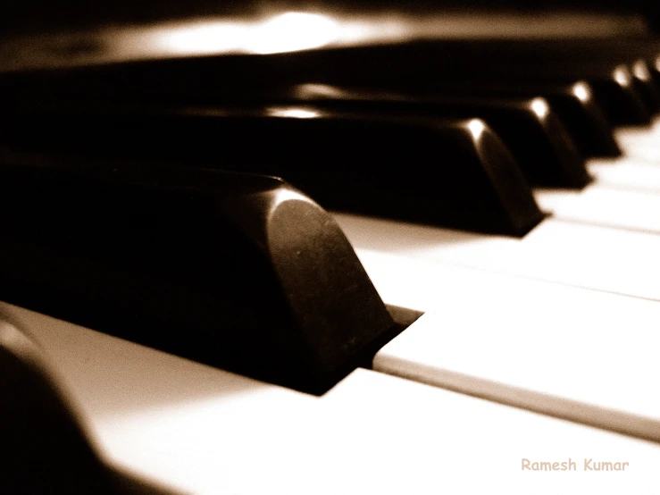 a close up view of a piano keyboard