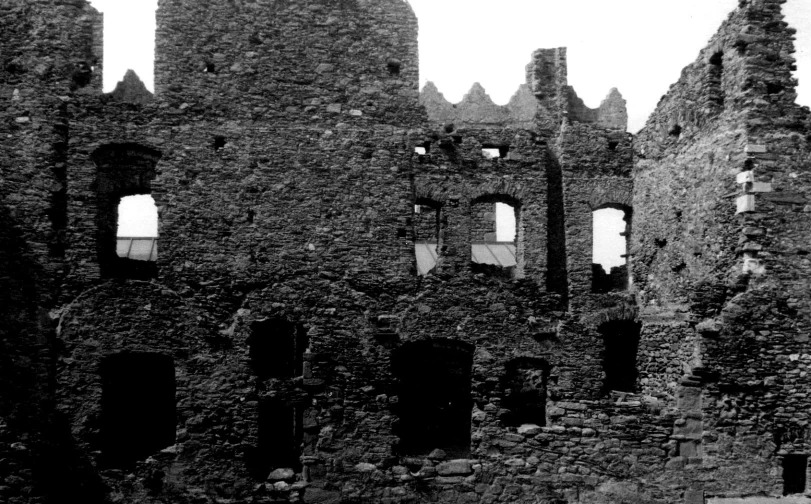 ruins, windows and doors in an old stone church