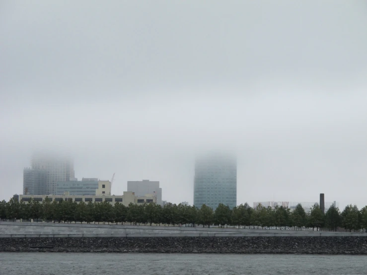 a large body of water near a city skyline