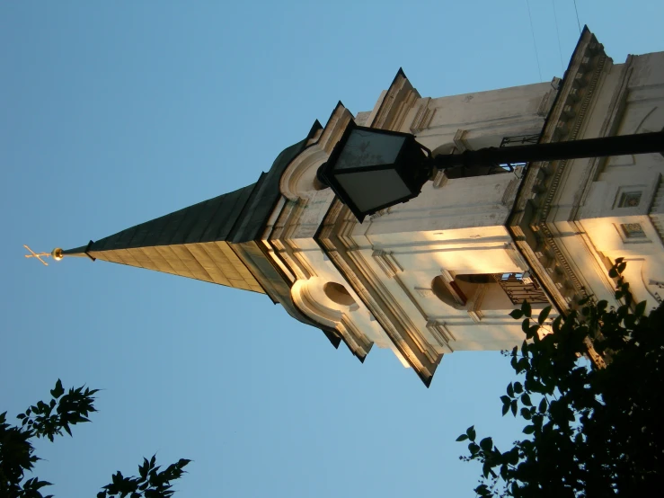 a very large church bell tower with clocks