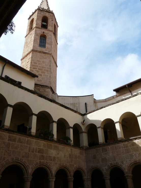 a large tower that is next to a building