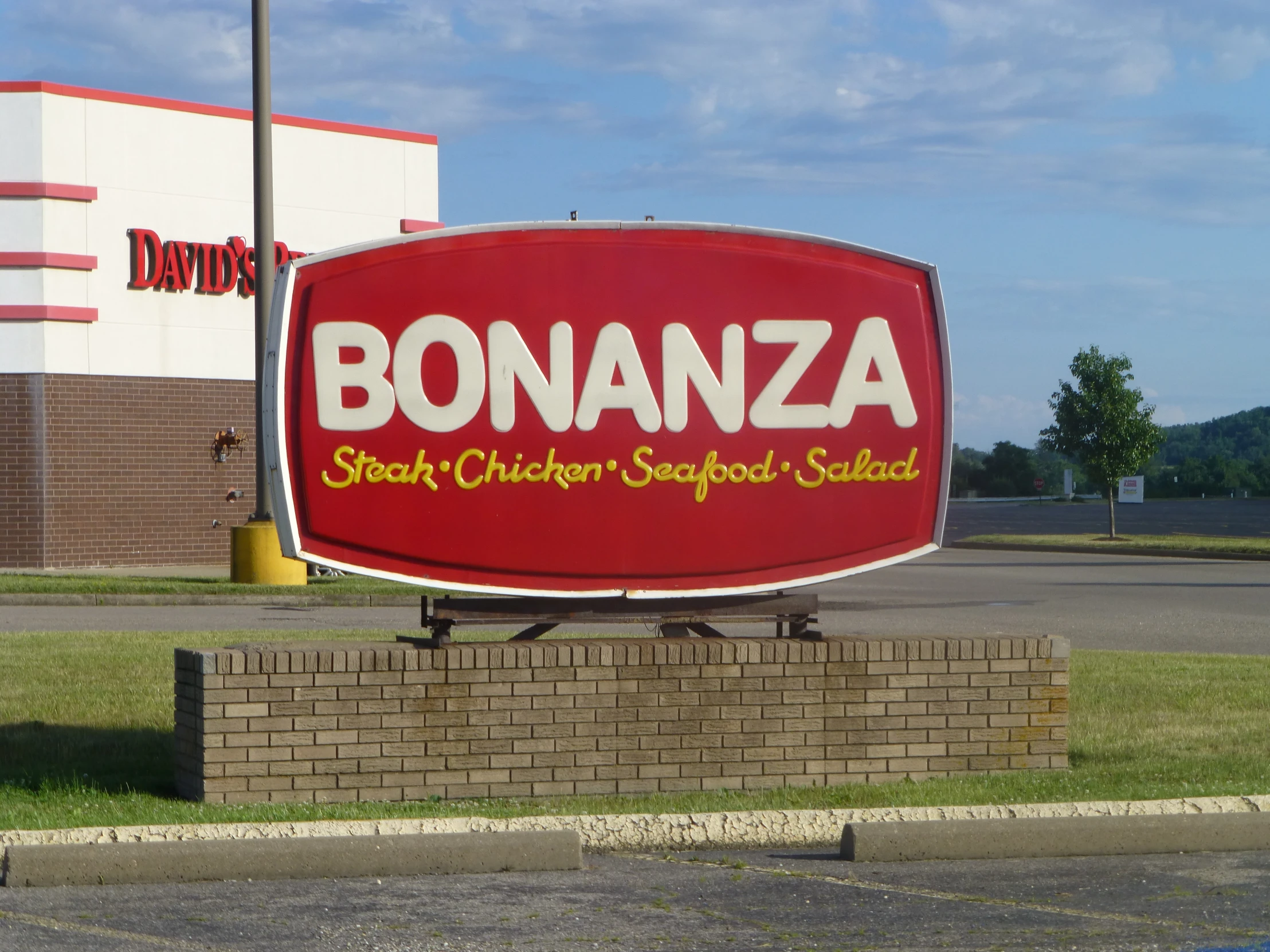 a bonzana store sign that has been carved to resemble the words bonzana