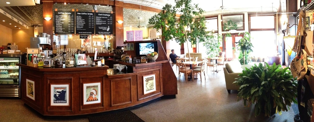 a very large and well decorated bar inside a restaurant