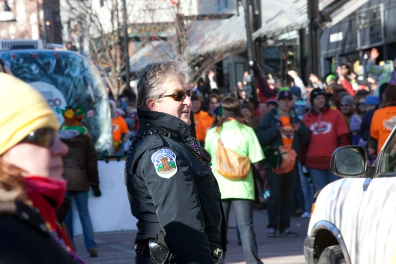 a police officer talking to a woman in the street