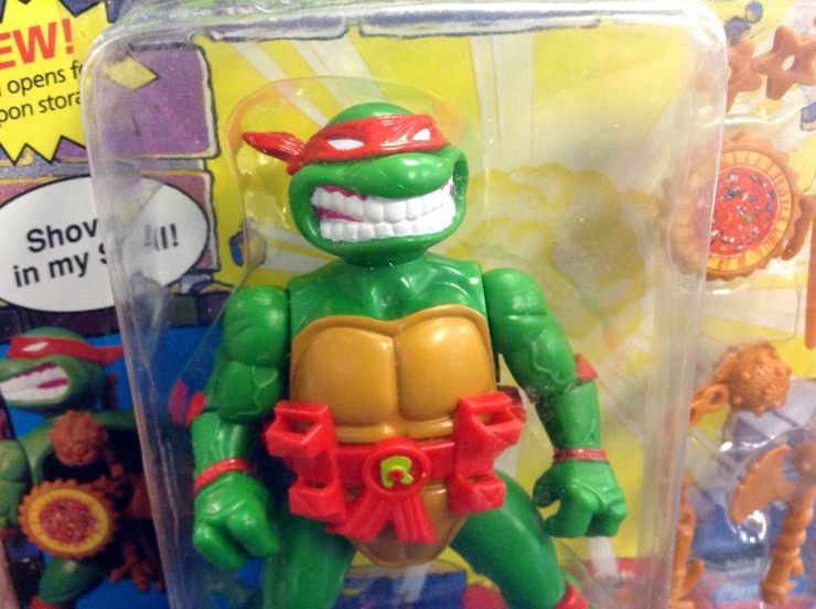 toy of teenage mutant wearing a red helmet