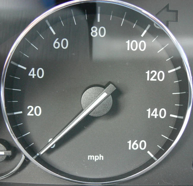 an instrument with the temperature of the car is shown