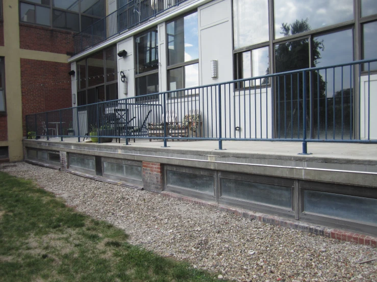 view of a concrete patio area in front of a building