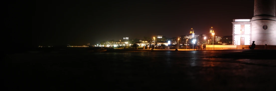 a clock tower in the middle of a night time scene