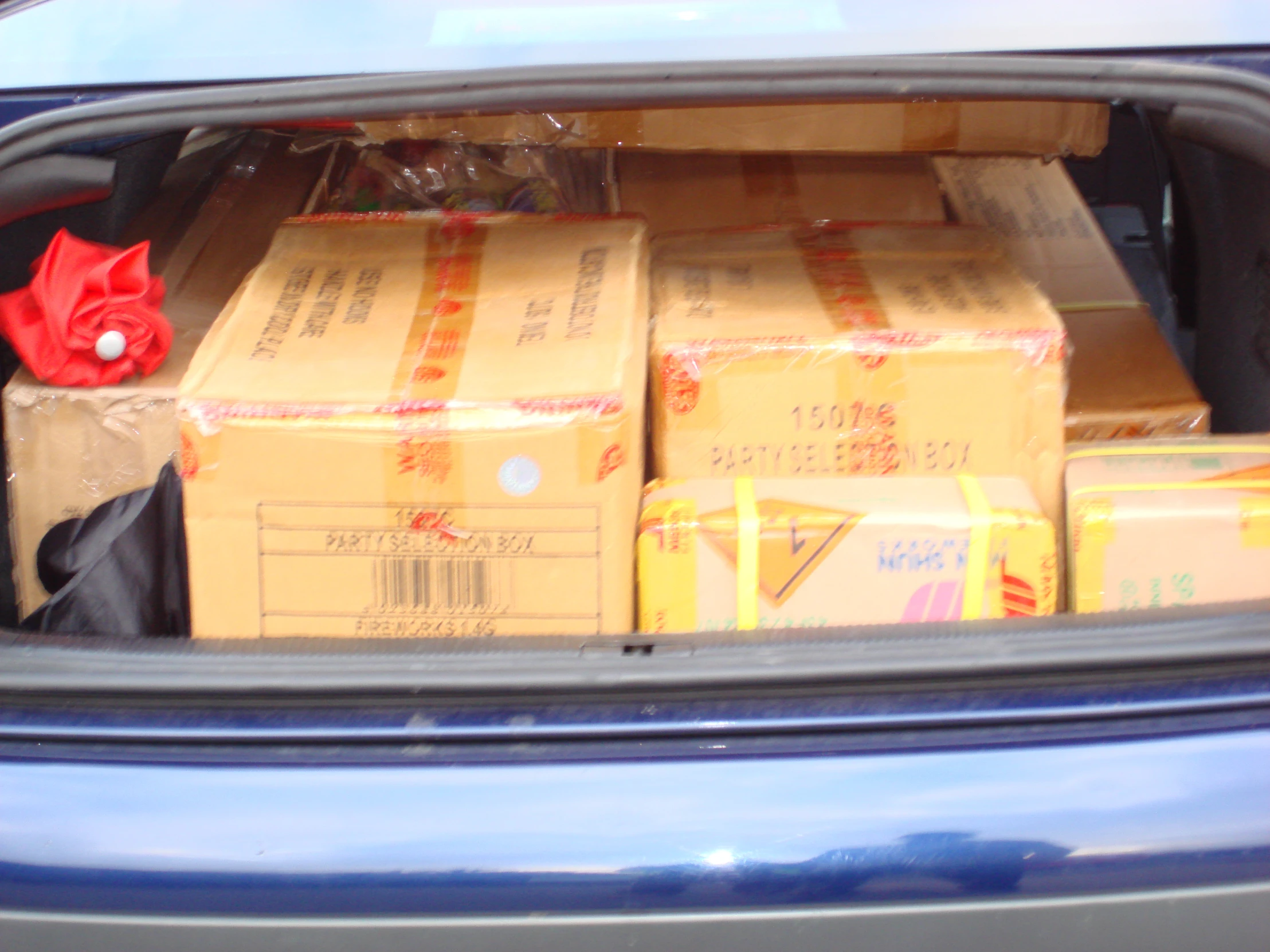 the trunk of a car filled with boxes