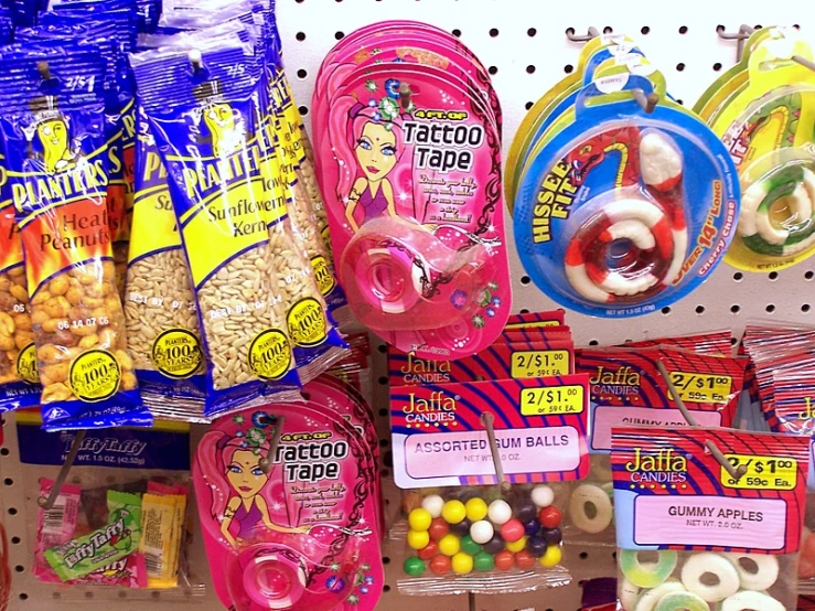 a display of various baggies and candy in bags