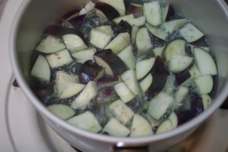 the food is being cooked in the pot