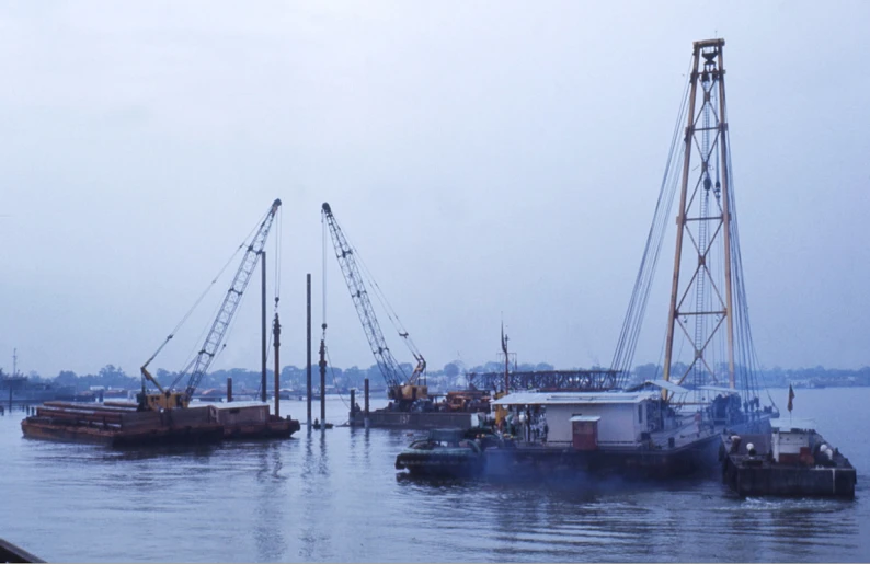 a boat in a body of water surrounded by boats