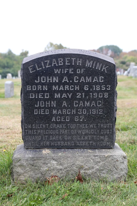 the headstone of elizabeth winke and john acamac at a cemetery