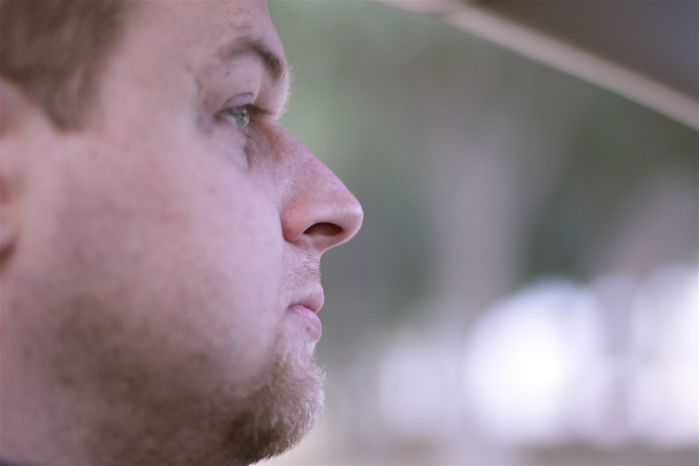 a close - up of the head of a young man