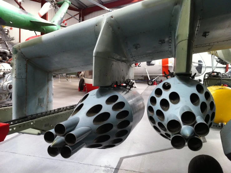 some very big pretty airplanes on a hanger