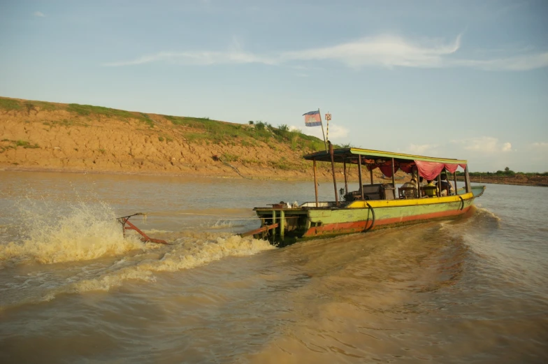 a large boat riding across a body of water