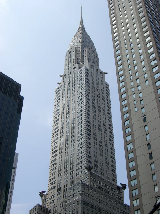 two tall buildings towering over the city