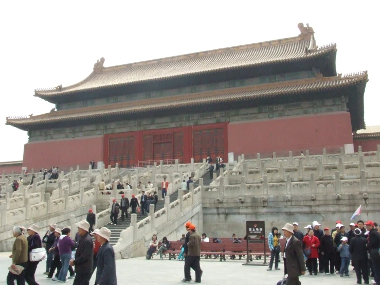 people in old fashion walking near some stairs