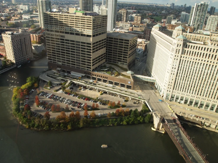 a river and cityscape near a bridge