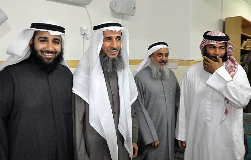 a group of men standing next to each other