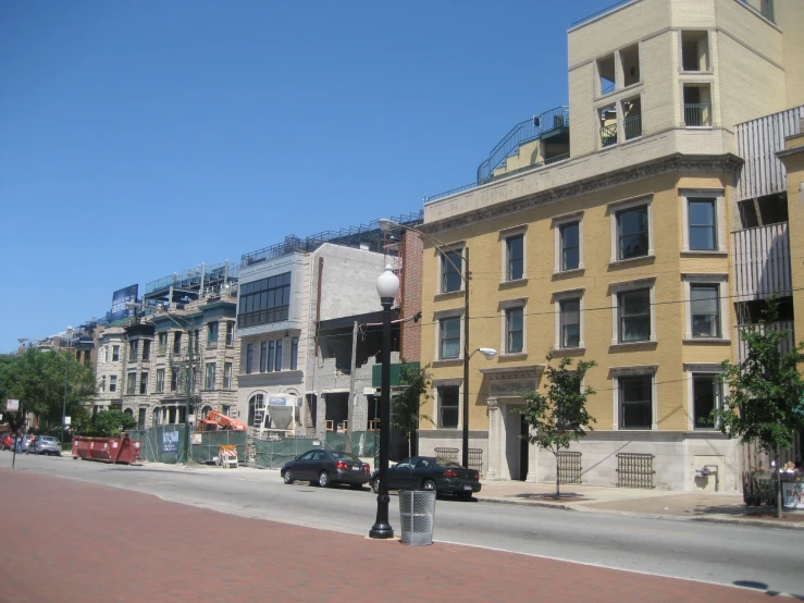 row of buildings on the side of a street