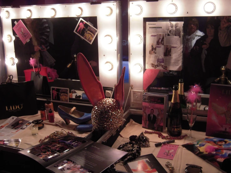 a vanity with several objects on top of it