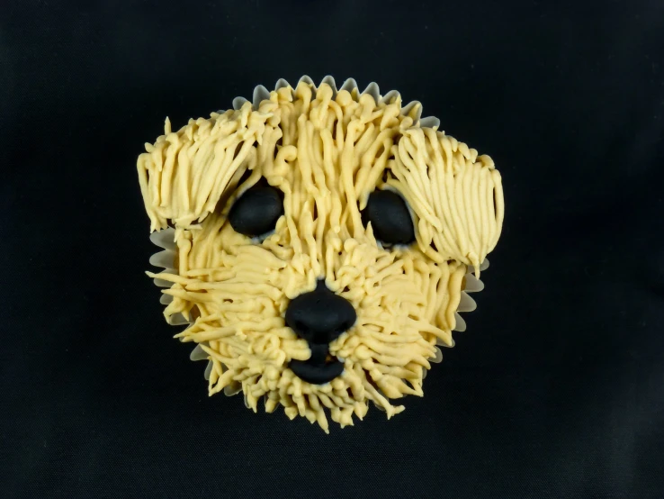 a cake made like an animal made out of spaghetti