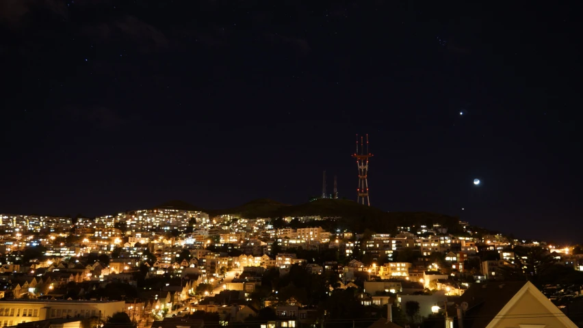 there is a small town in the night time sky