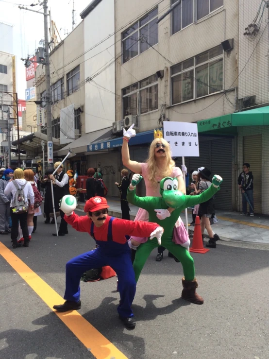 a person in costume is next to a guy