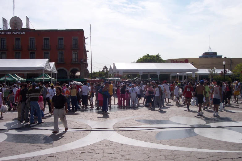 a group of people walking down a street