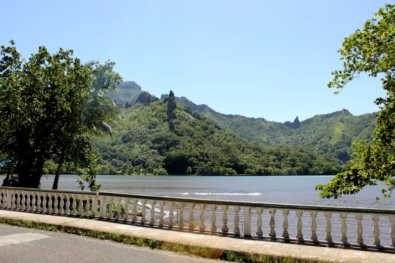 an empty river with mountains behind it