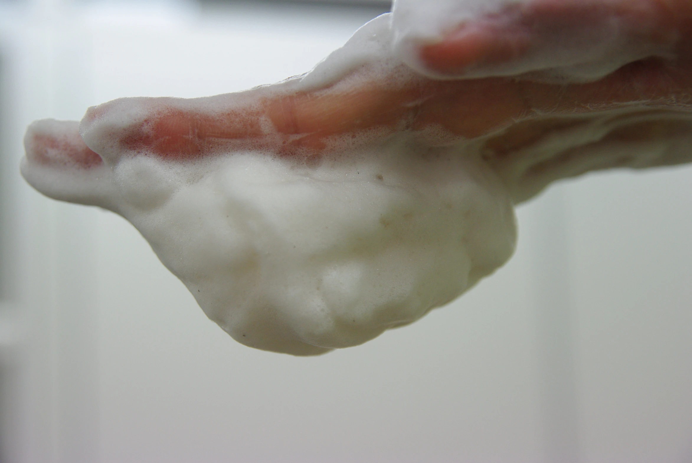 a closeup s of the cotton attached to a needle