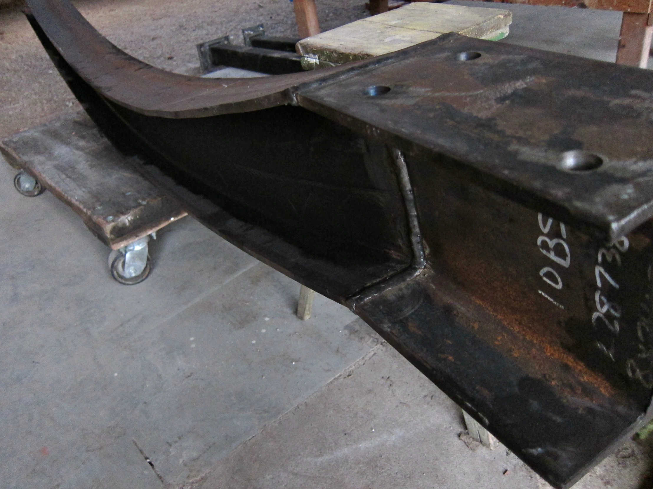 a toolbox is being placed in the shape of a boat