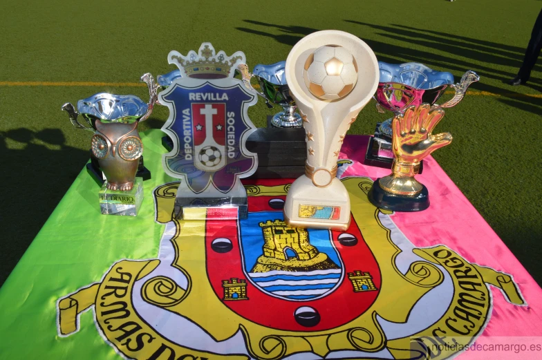 many trophies are on display on a field